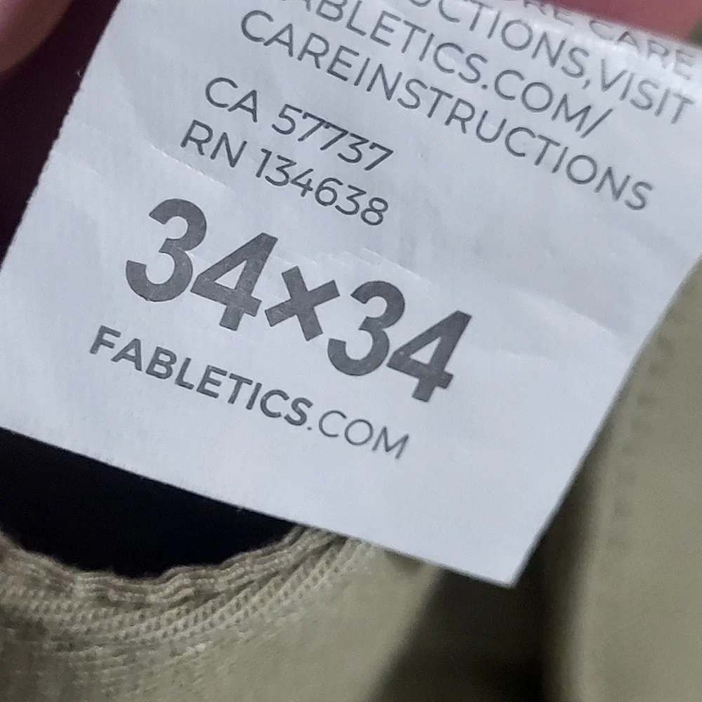 Fabletics The One Pant Mens 34x34 Khaki Tan Stretch Chino PT2354910-3487-34034